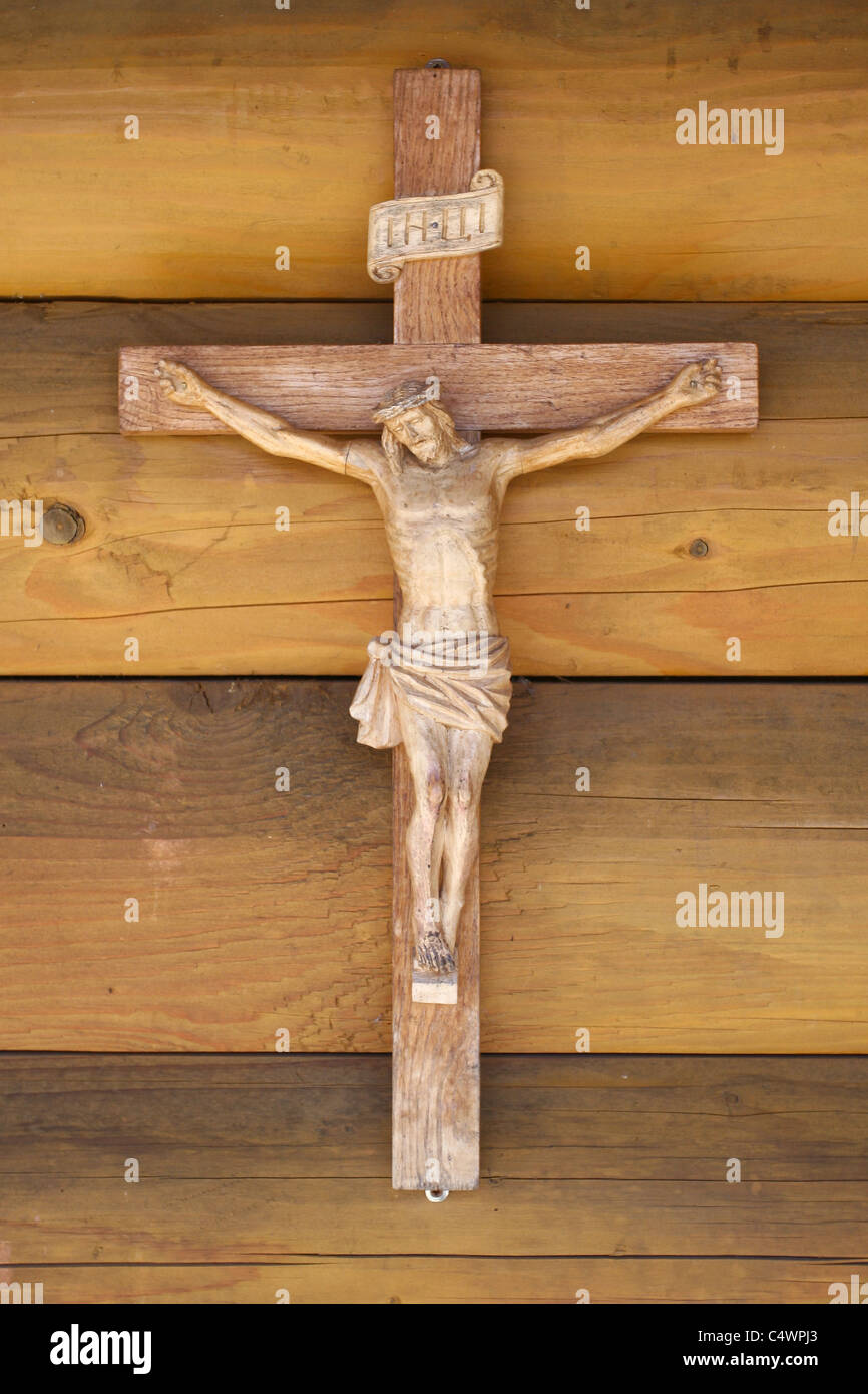 Wooden cross with gold Jesus Christ crucifixion Stock Photo Alamy
