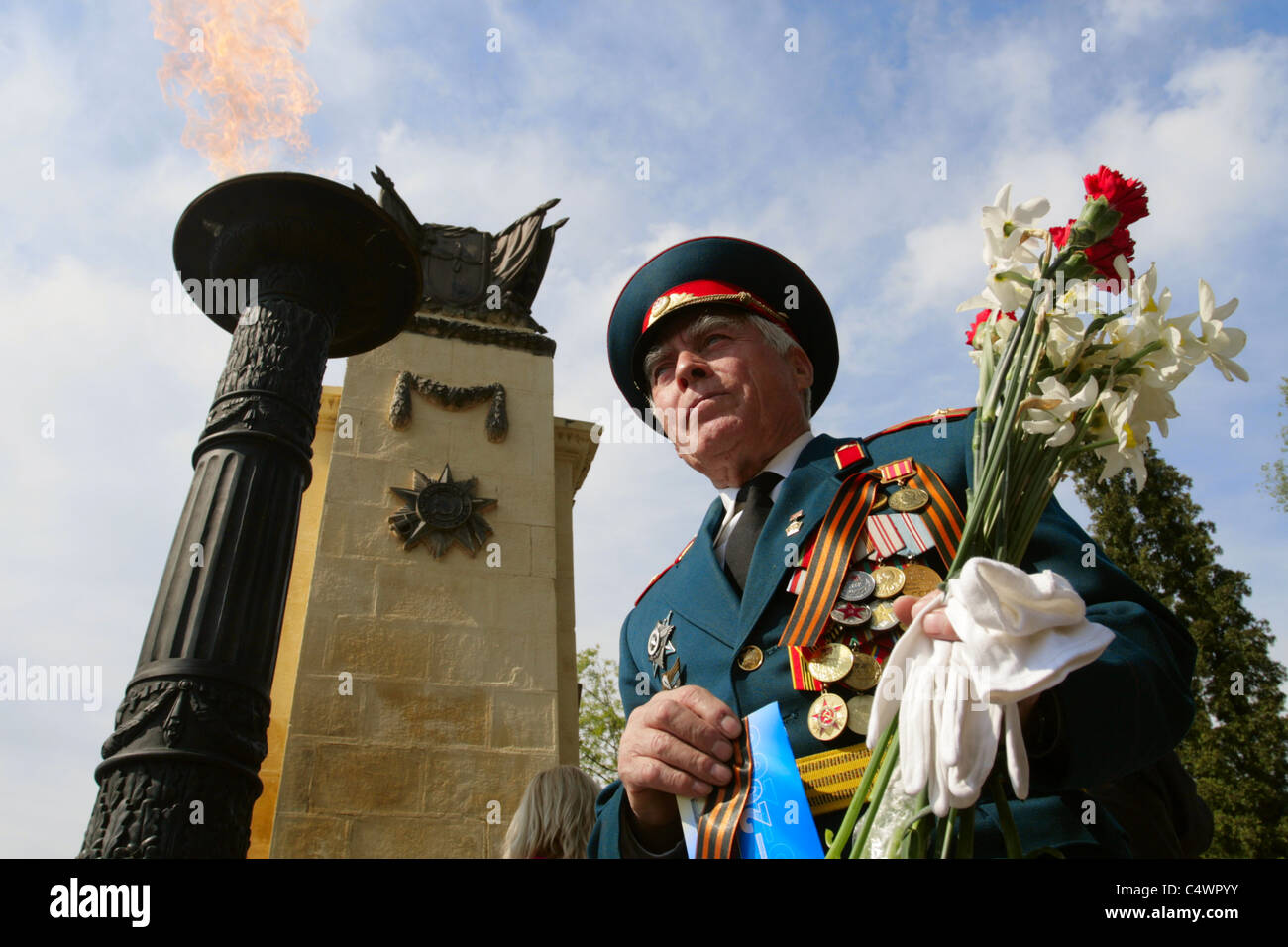 World War II veterans with flowers at the Victory Day celebration in ...