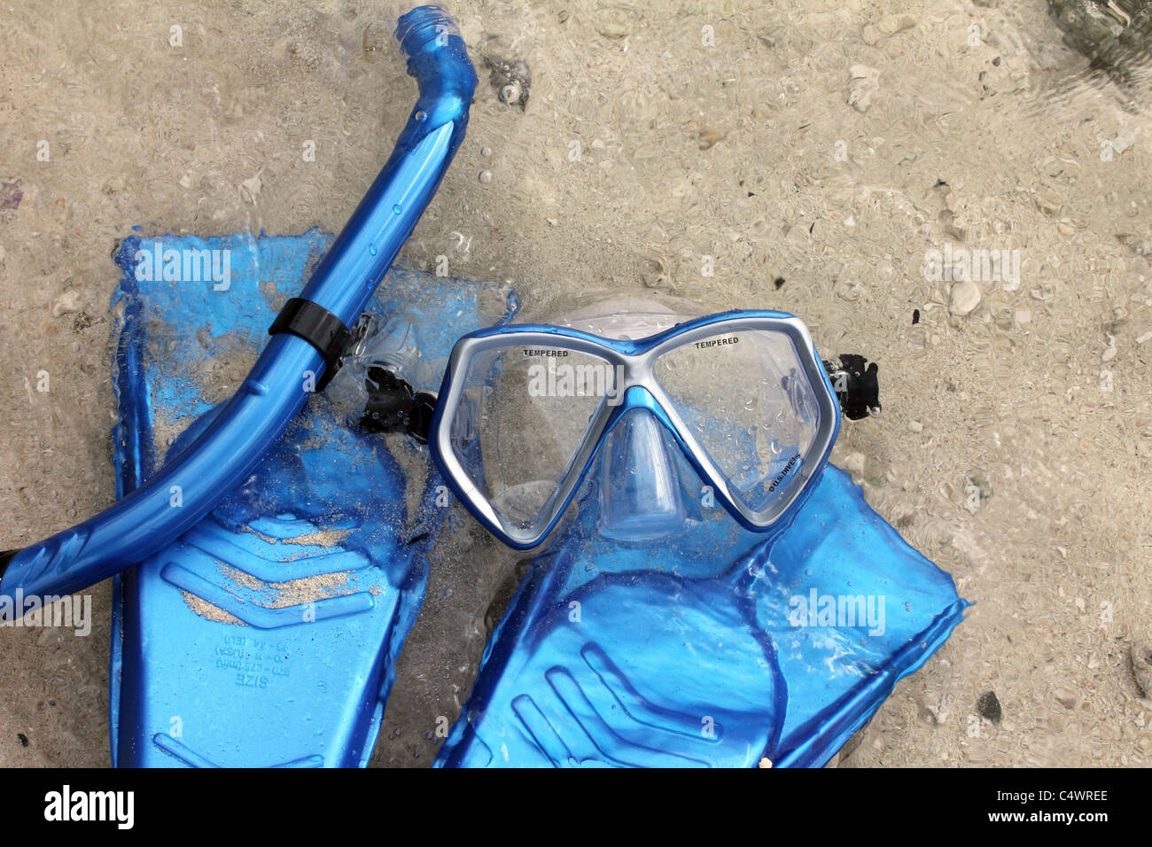 BLUE SNORKEL GOGGLES AND FLIPPERS ON A BEACH BDB Stock Photo Alamy
