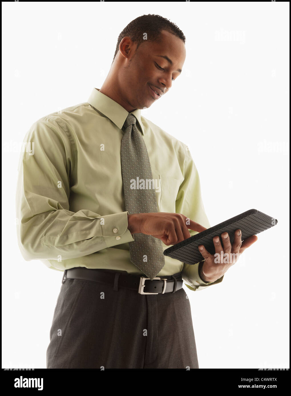 Content young businessman examining file Stock Photo