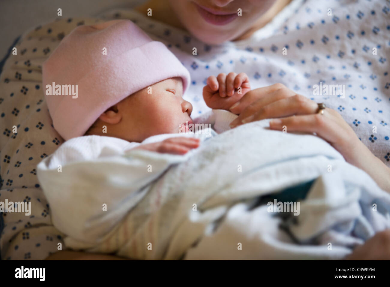 USA,Utah,Salt Lake City,Portrait of newborn girl (0-1months) with mother Stock Photo