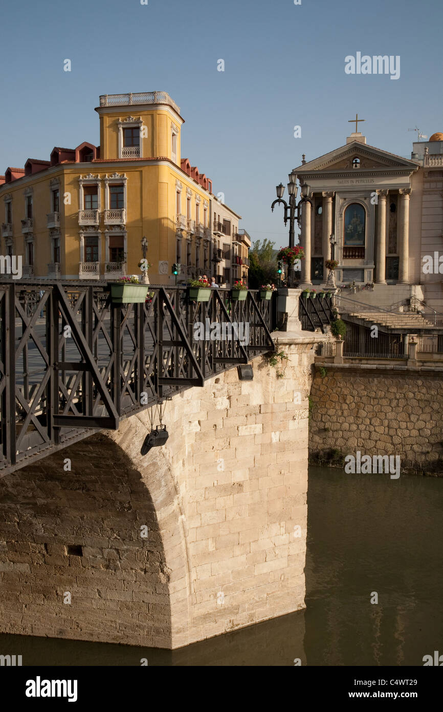 Puente Viejo - The Old Bridge crossing the Segura River in Murcia with the Nuestra Señora de los Peligros Church, Spain Stock Photo