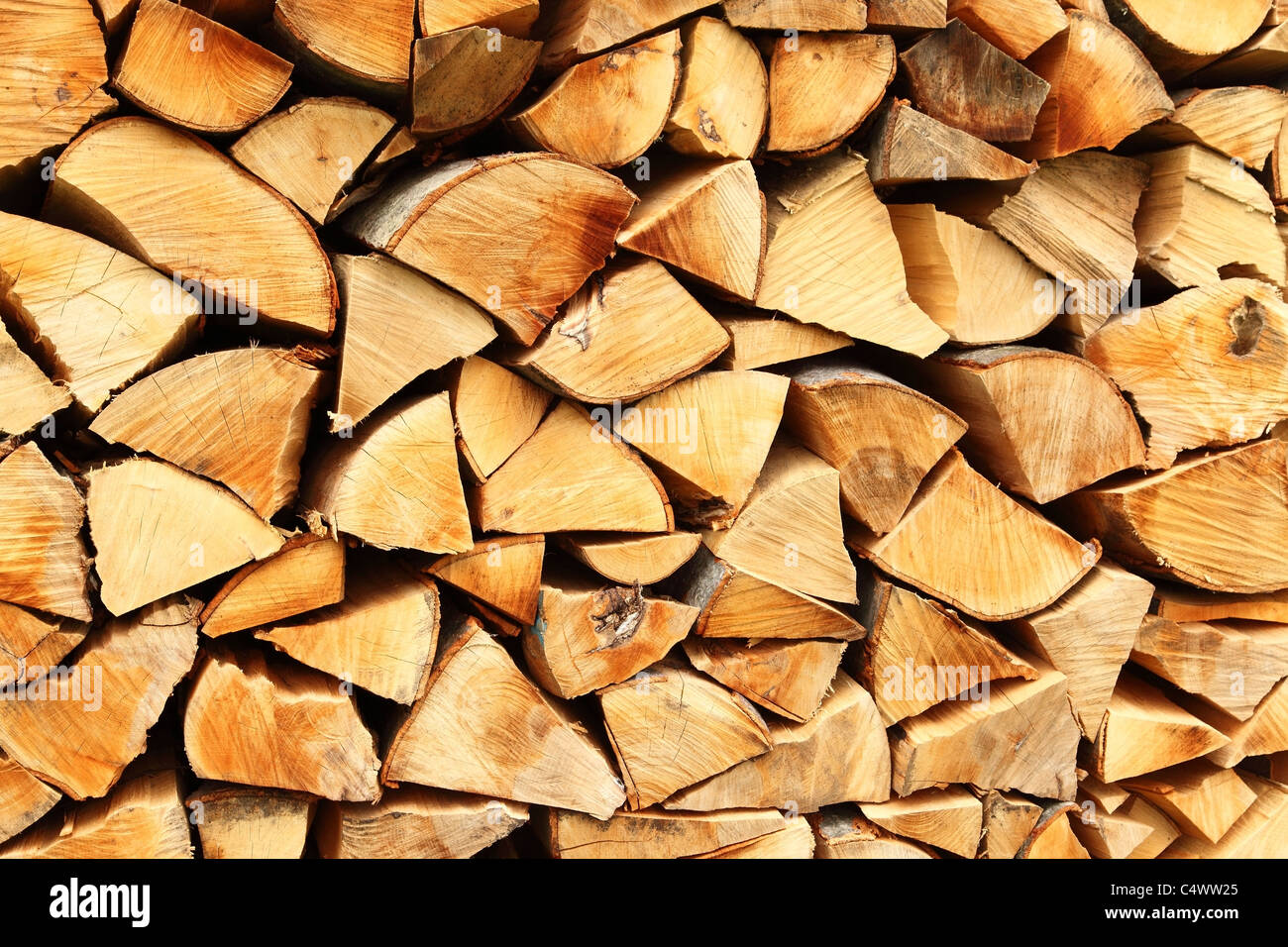 Pile of chopped fire wood prepared for winter Stock Photo
