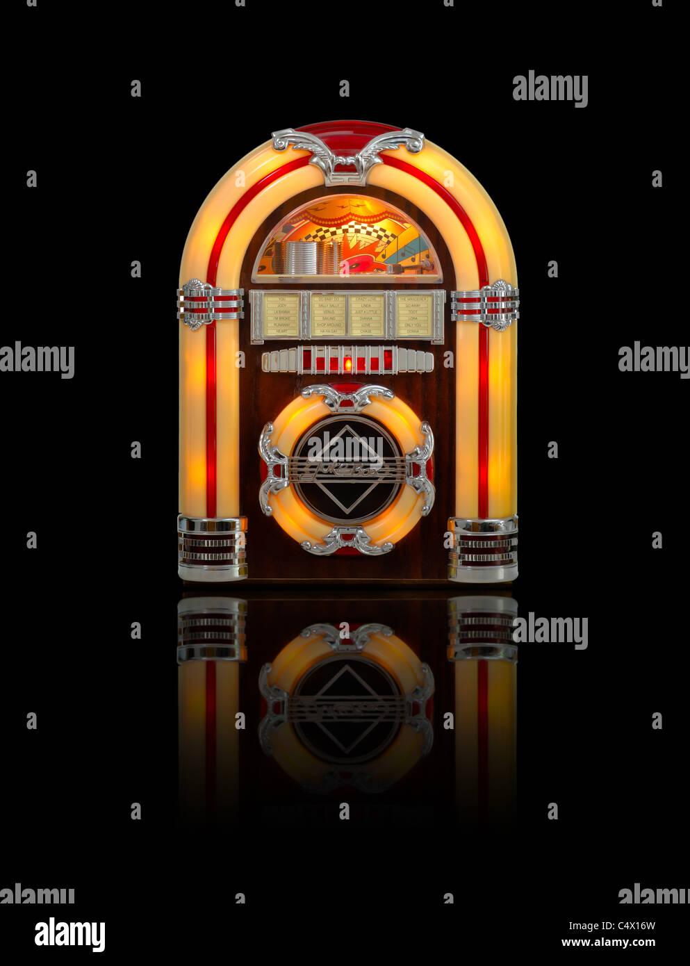 Retro jukebox radio isolated on black background with reflection Stock Photo
