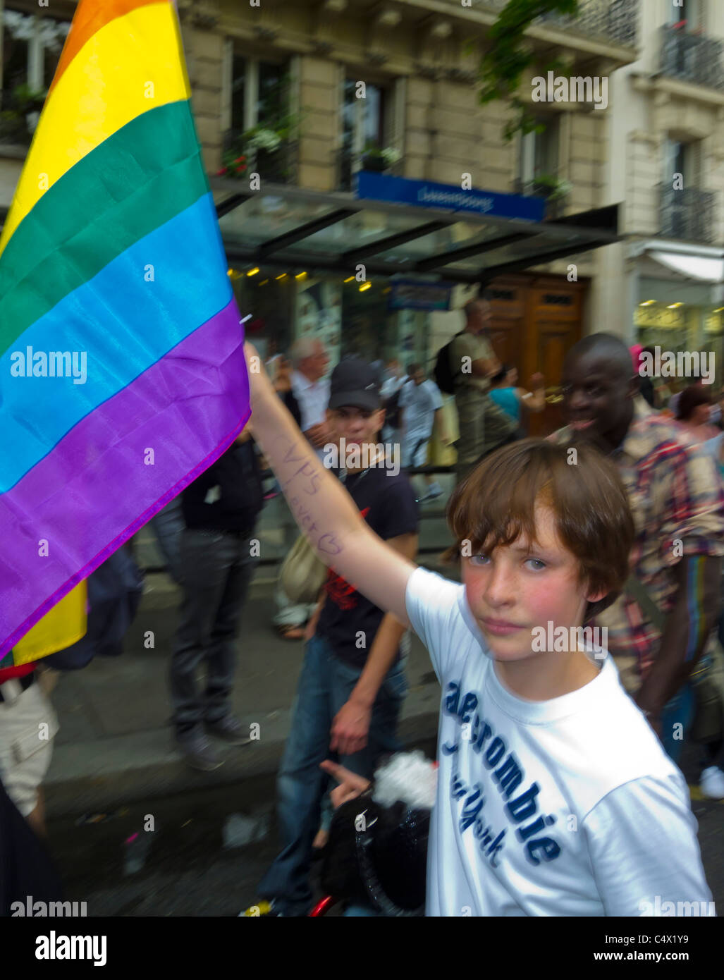 Paris, France, Young Teen Waving Gay Rainbow Flag at the Gay Pride Parade,  LGTBQI+ March, gay rights struggle, pride march, teens pride parade Stock  Photo - Alamy