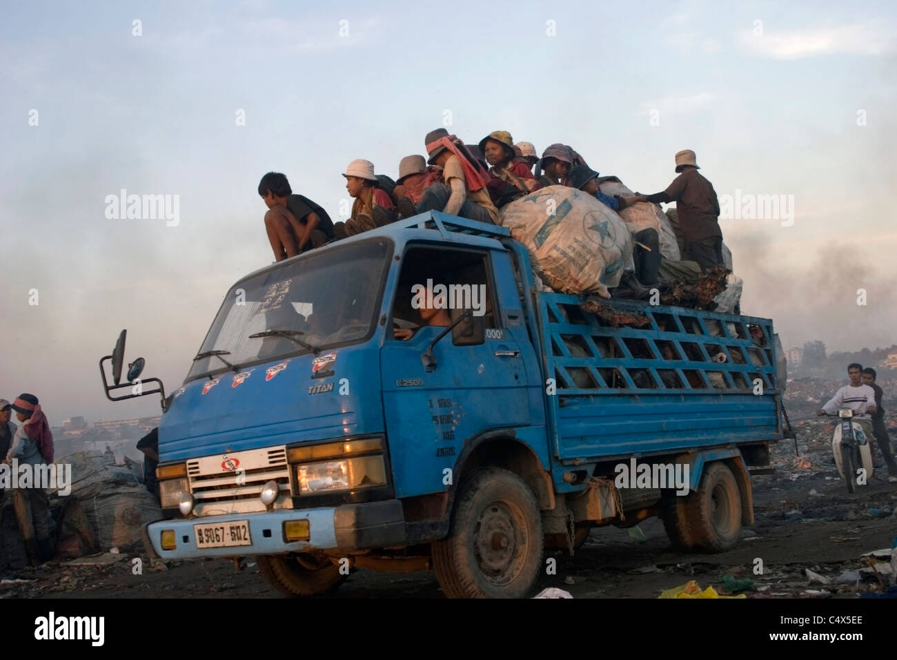 riding garbage truck