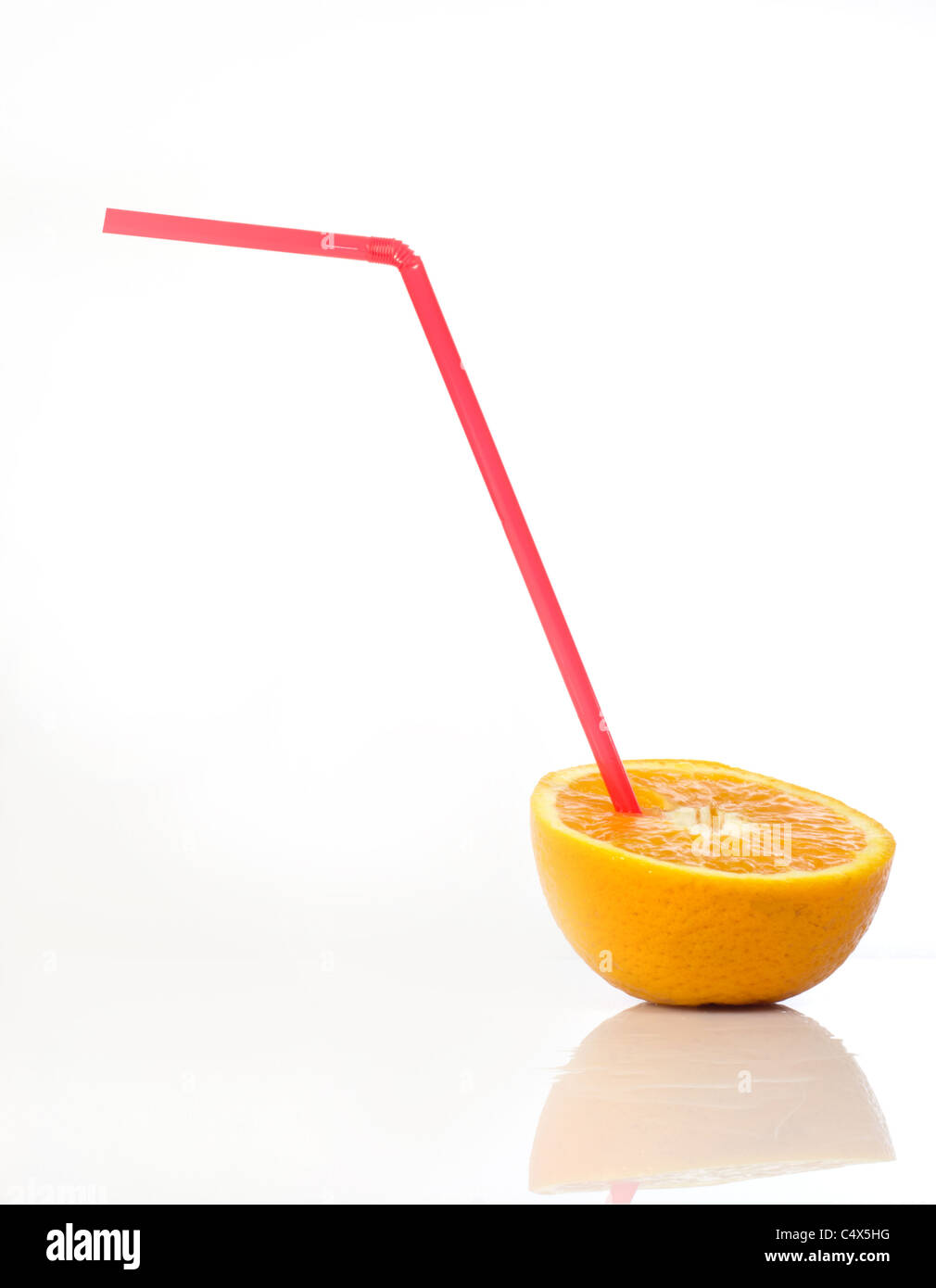 orange with a straw Stock Photo