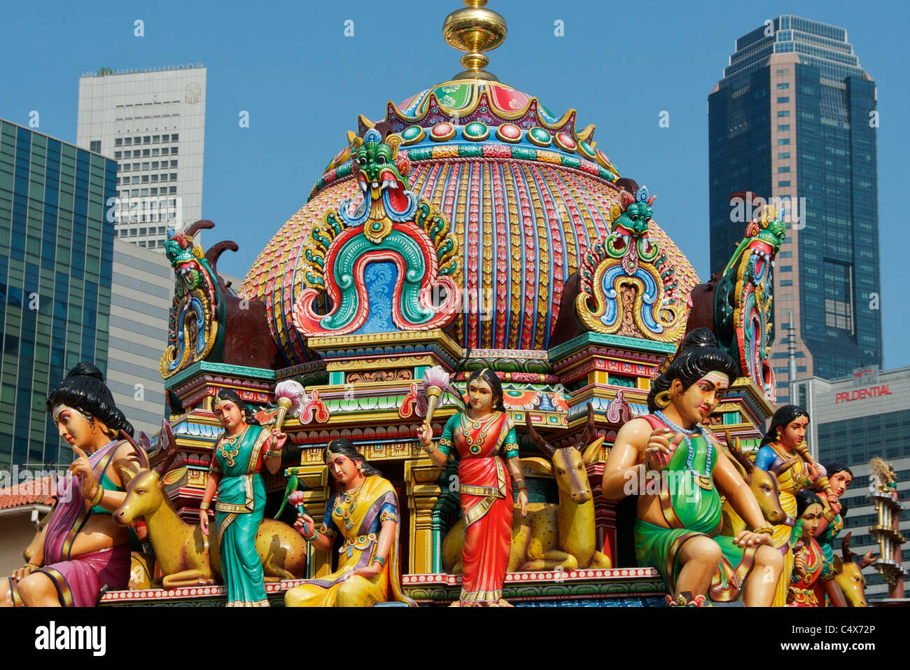 Colourful sculptures on the Sri Srinivasa Perumal Temple and financial district Singapore Stock Photo