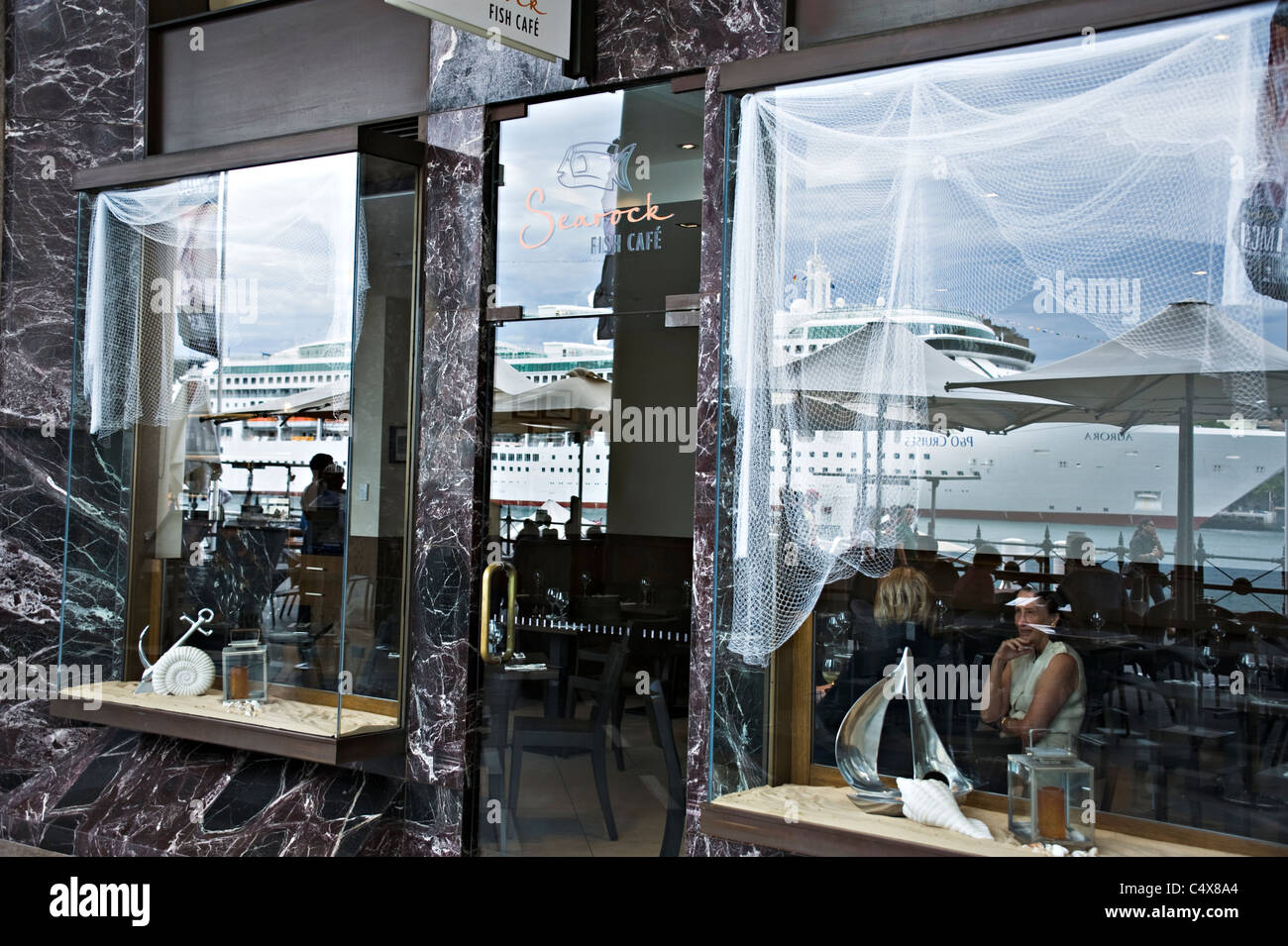 Reflection of P & O Cruise Ship Aurora in Window Of Cafe near Circular Quay Sydney New South Wales Australia Stock Photo