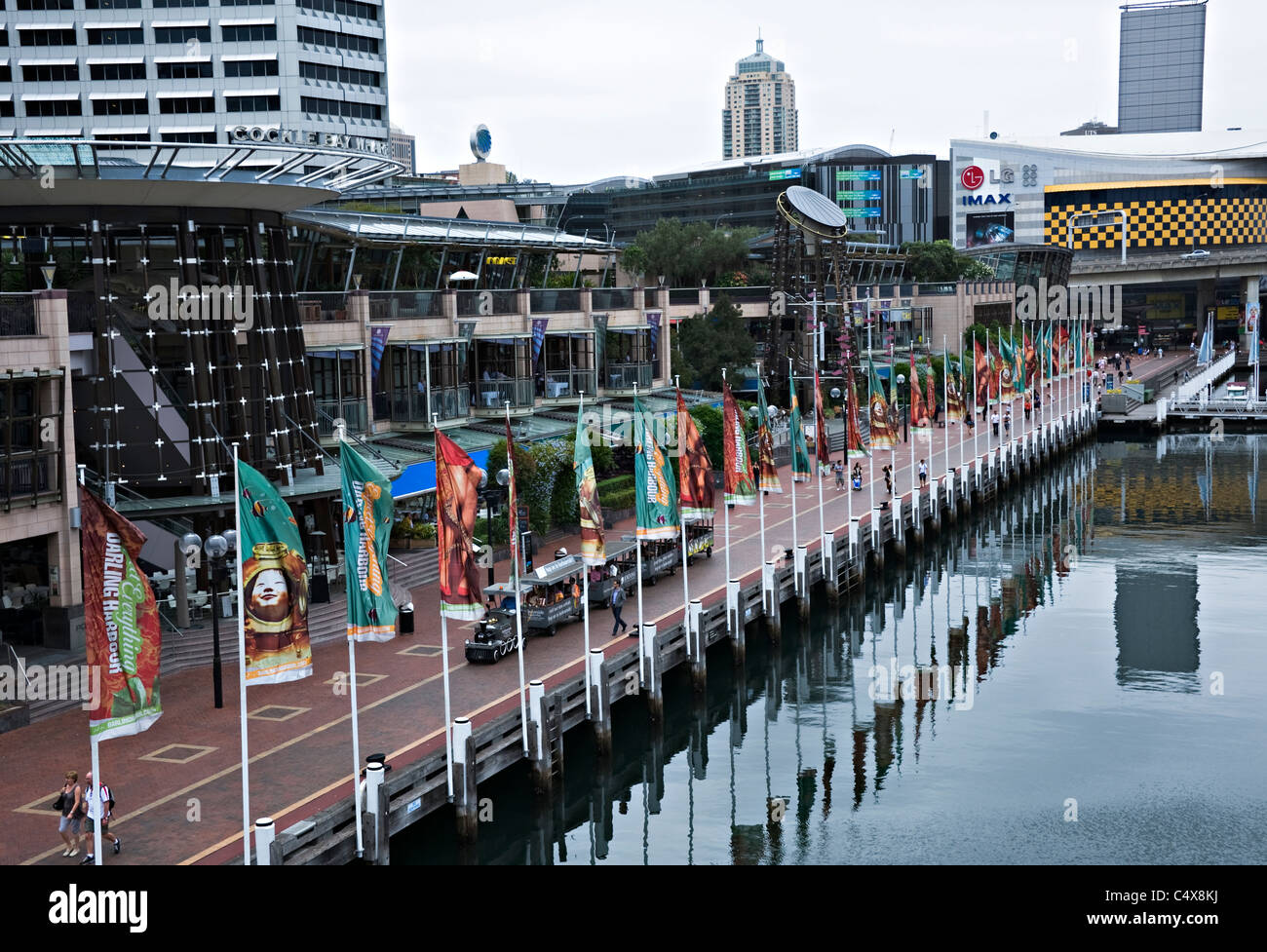 The Charming Cockle Bay Wharf with Shops and Tourist Train at Darling Harbour Sydney New South Wales NSW Australia Stock Photo
