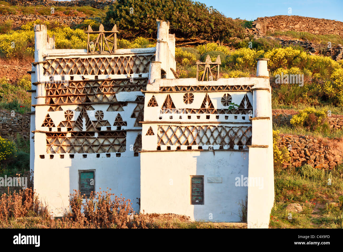 Morning light falling on a traditional dovecote on Tinos Island, Greece Stock Photo