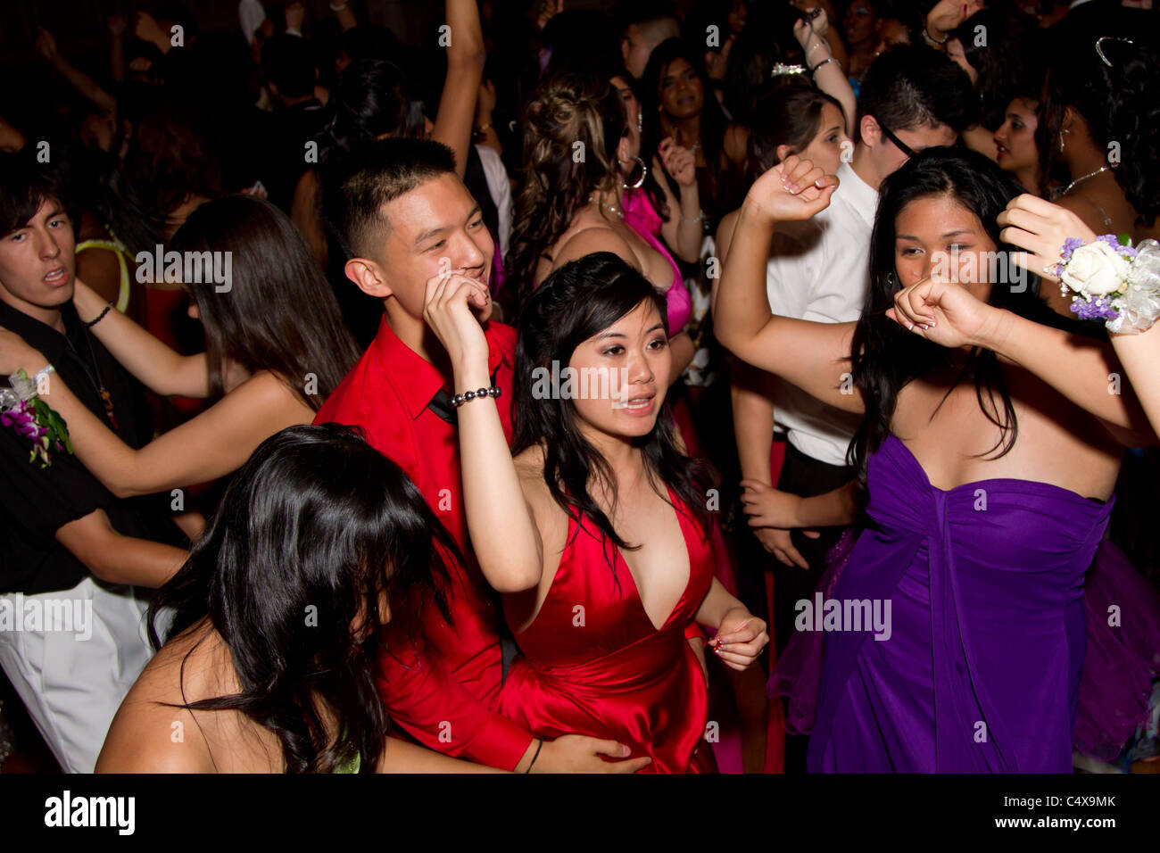 teenager girls guys friends party partying dancing Stock Photo