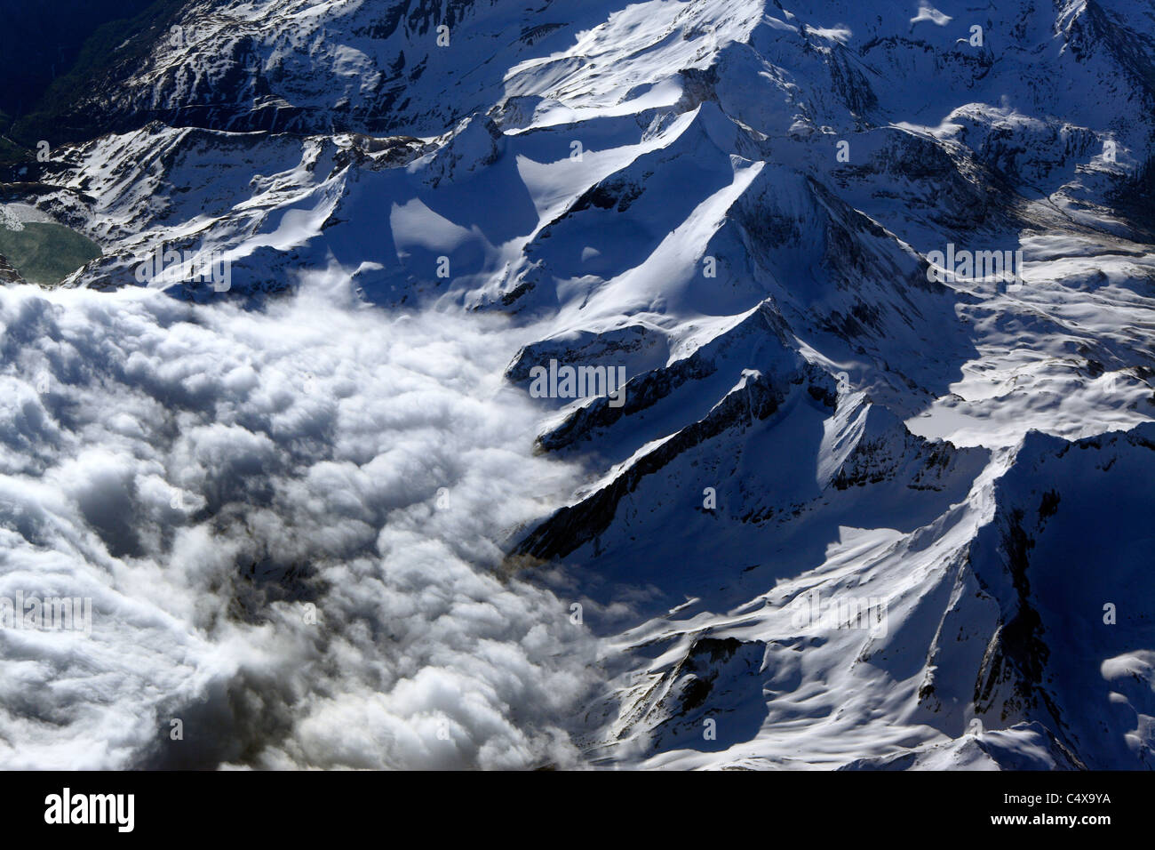 View of Alps mountains from air plane Stock Photo