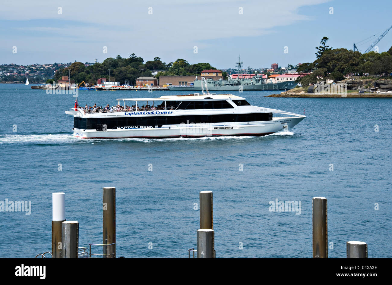 Captain Cook III Tourist Cruise Boat By Mrs Macquaries Point with Garden Island in Sydney New South Wales Australia Stock Photo