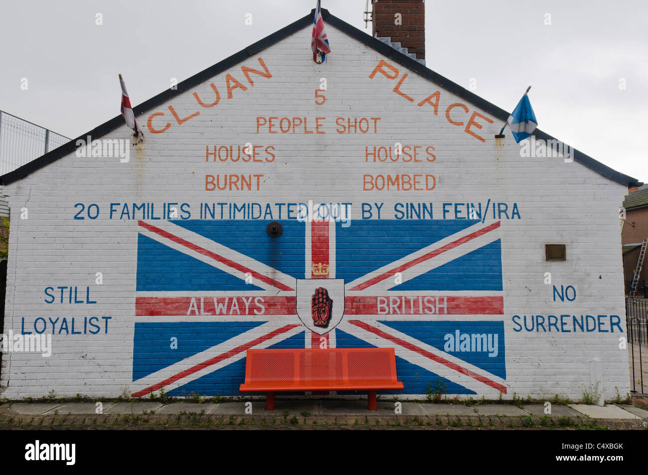 Mural in Cluan Place claiming residents have been intimidated out by IRA/Sinn Fein. Stock Photo