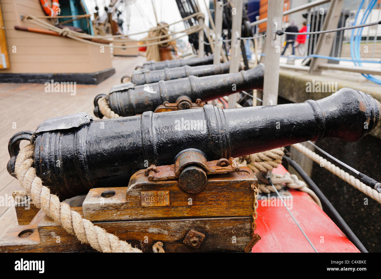 Small but functioning cannons on the deck of The Bounty tall ship Stock Photo