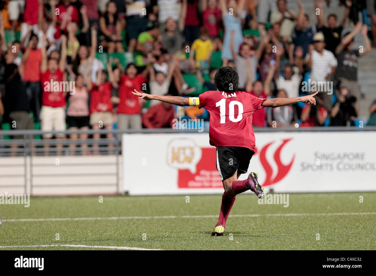 Adam Swandi of Singapore U15 reacts to scoring Singapore's third goal