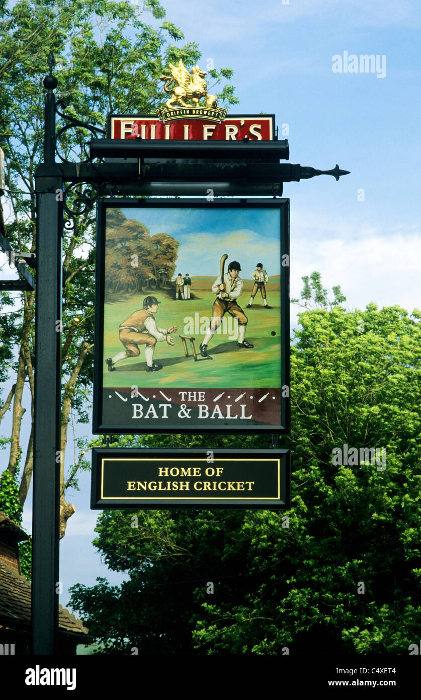 Hambledon, Hampshire, The Bat and Ball Pub, inn sign signs pubs Fullers Brewery Broadhalfpenny Down England UK English inns Stock Photo