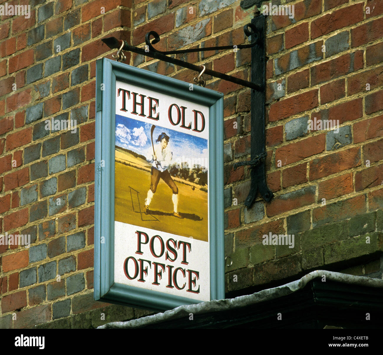 Hambledon, Hampshire, The Old Post Office Sign cricket cricketer cricketers batsman batsmen vintage bat bats ball English Stock Photo