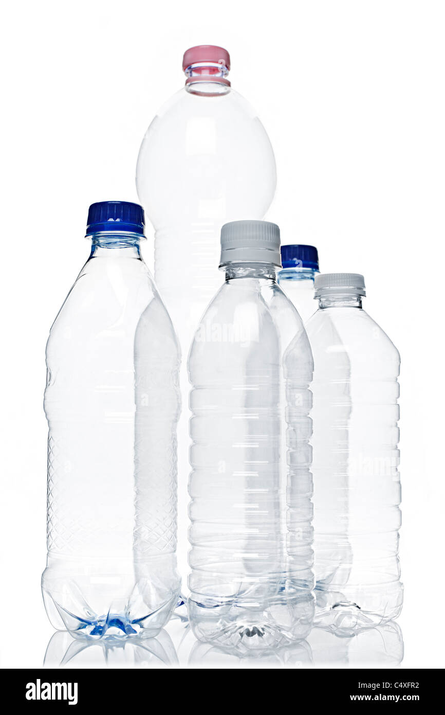Assorted clear empty plastic recyclable bottles isolated on white Stock Photo