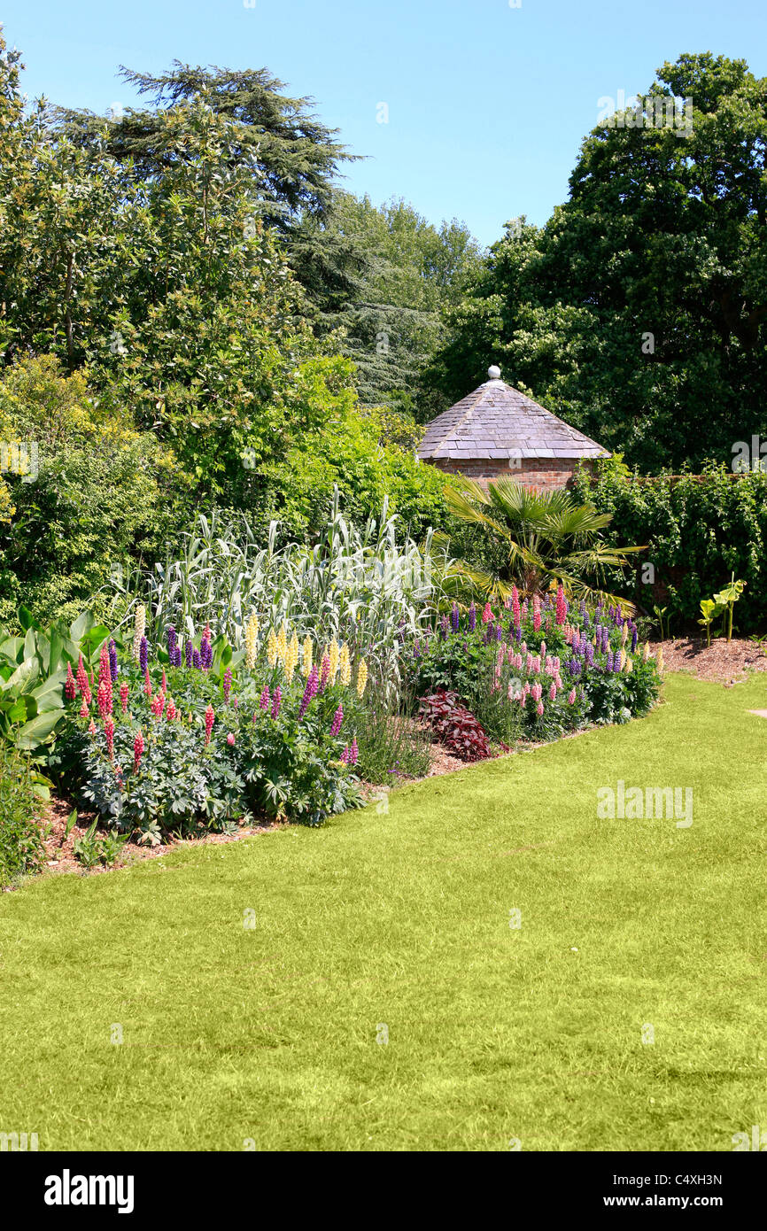 Summer Flowerbeds in an English Walled Garden Stock Photo - Alamy