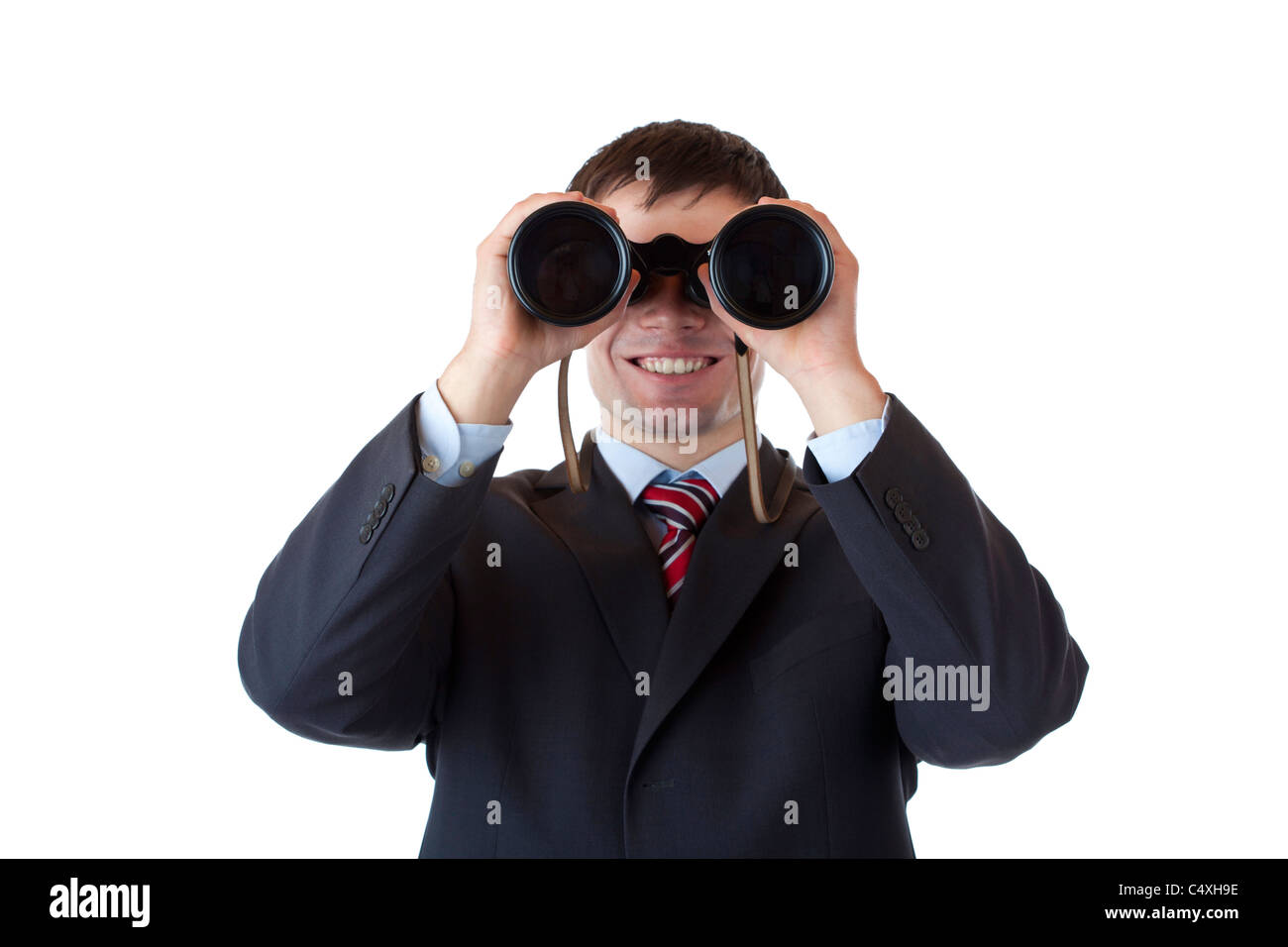 Smiling businessman looks through binoculars and espies business.Isolated on white background Stock Photo