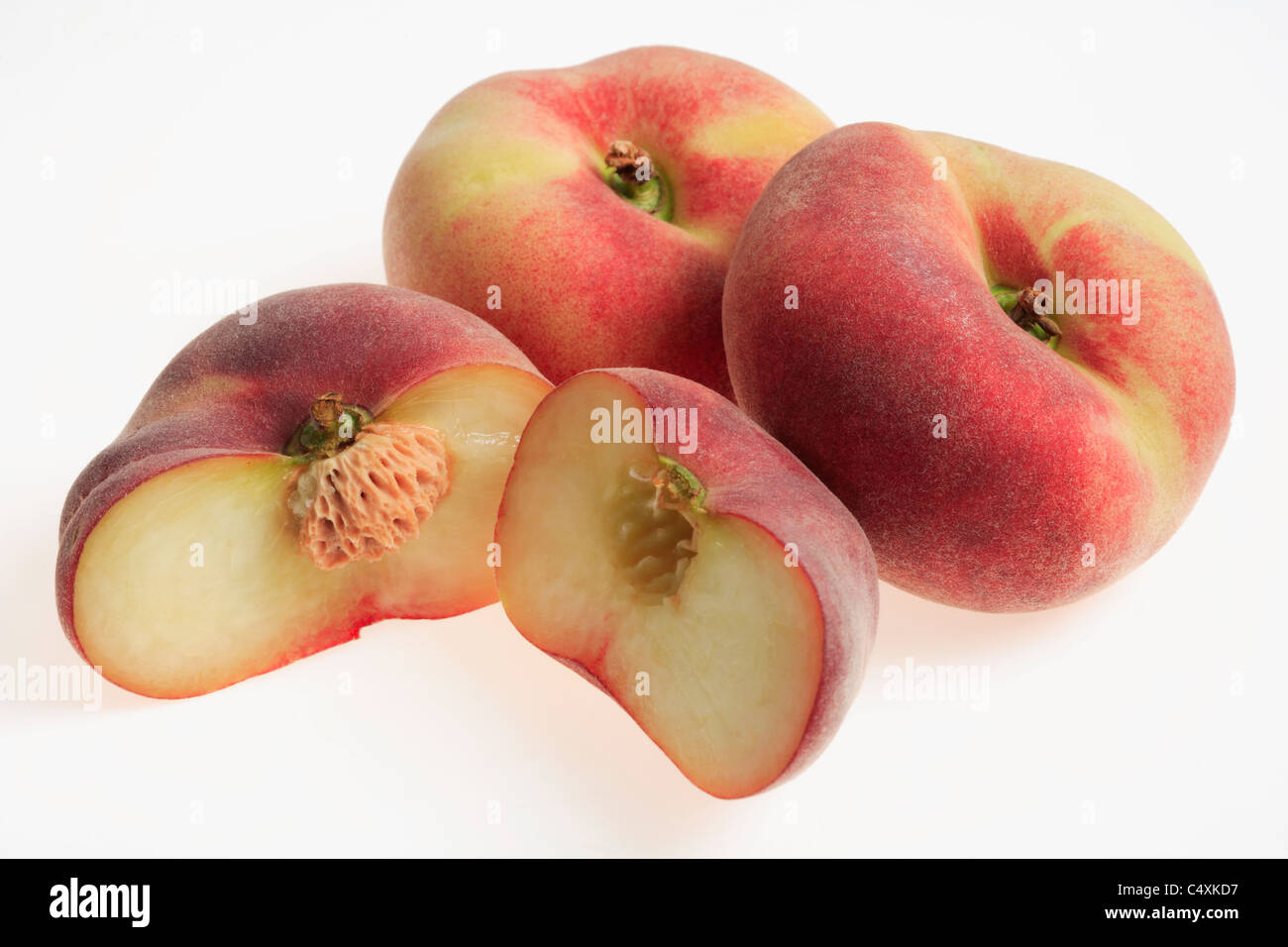 Flat Peaches - also known as Saturn Peaches or Donut Peaches. Stock Photo