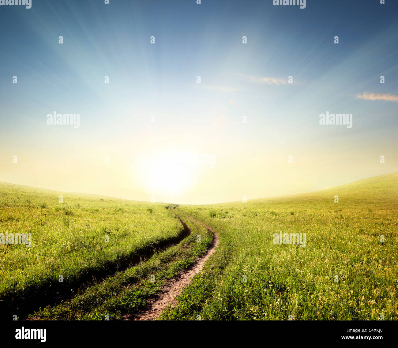 Rural path to sunrise Stock Photo