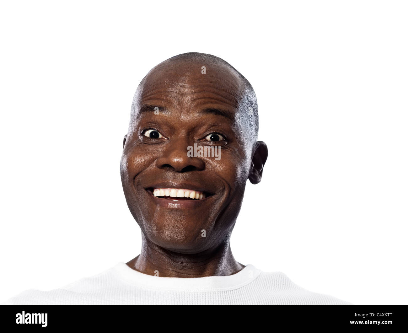 Portrait of an expressing happy Afro American man smiling in studio on white isolated background Stock Photo