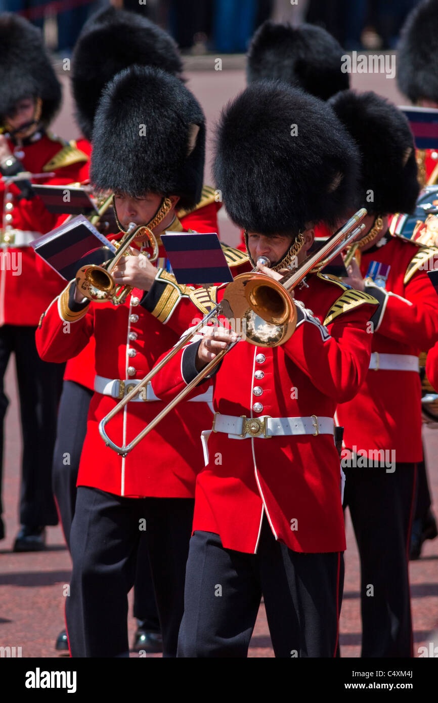 Guards marching band leaving Buckingham palace after the Changing of the guard Stock Photo