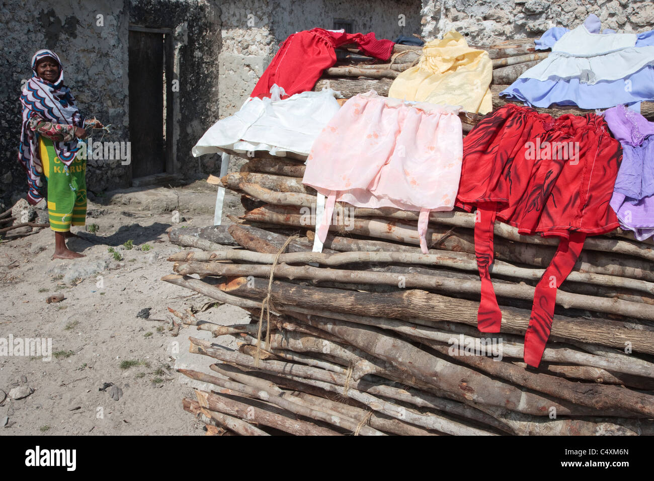 Clothing hanging out to dry, Chwaka village, Zanzibar, Tanzania Stock Photo