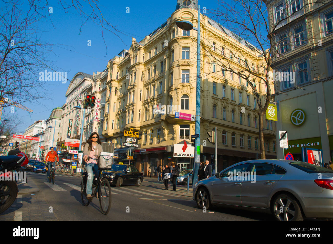 Traffic along Mariahilfer Strasse main shopping street Vienna Austria central Europe Stock Photo