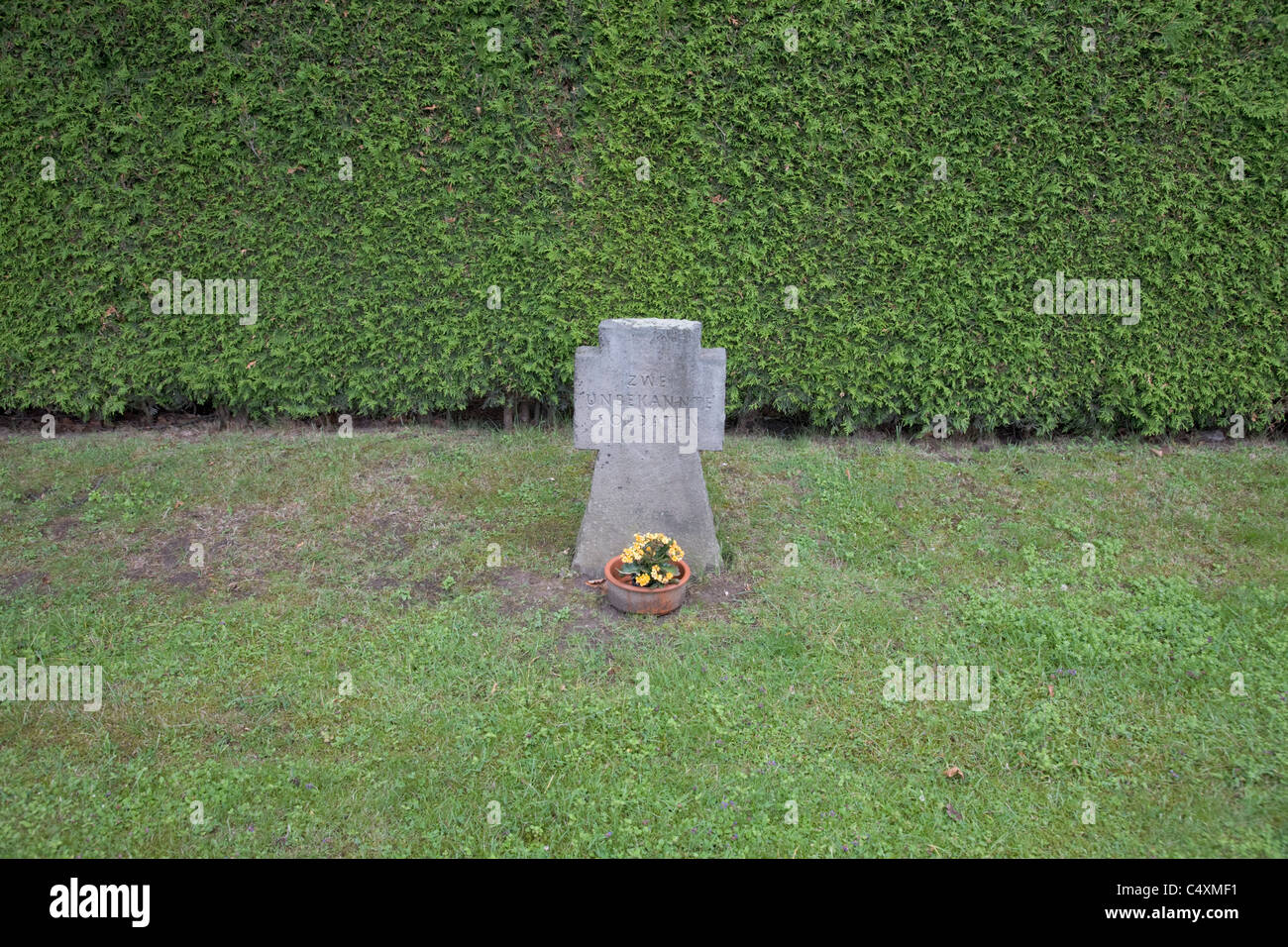 War headstone of an unknown German soldier in a German war cemetery in Cologne Germany Stock Photo