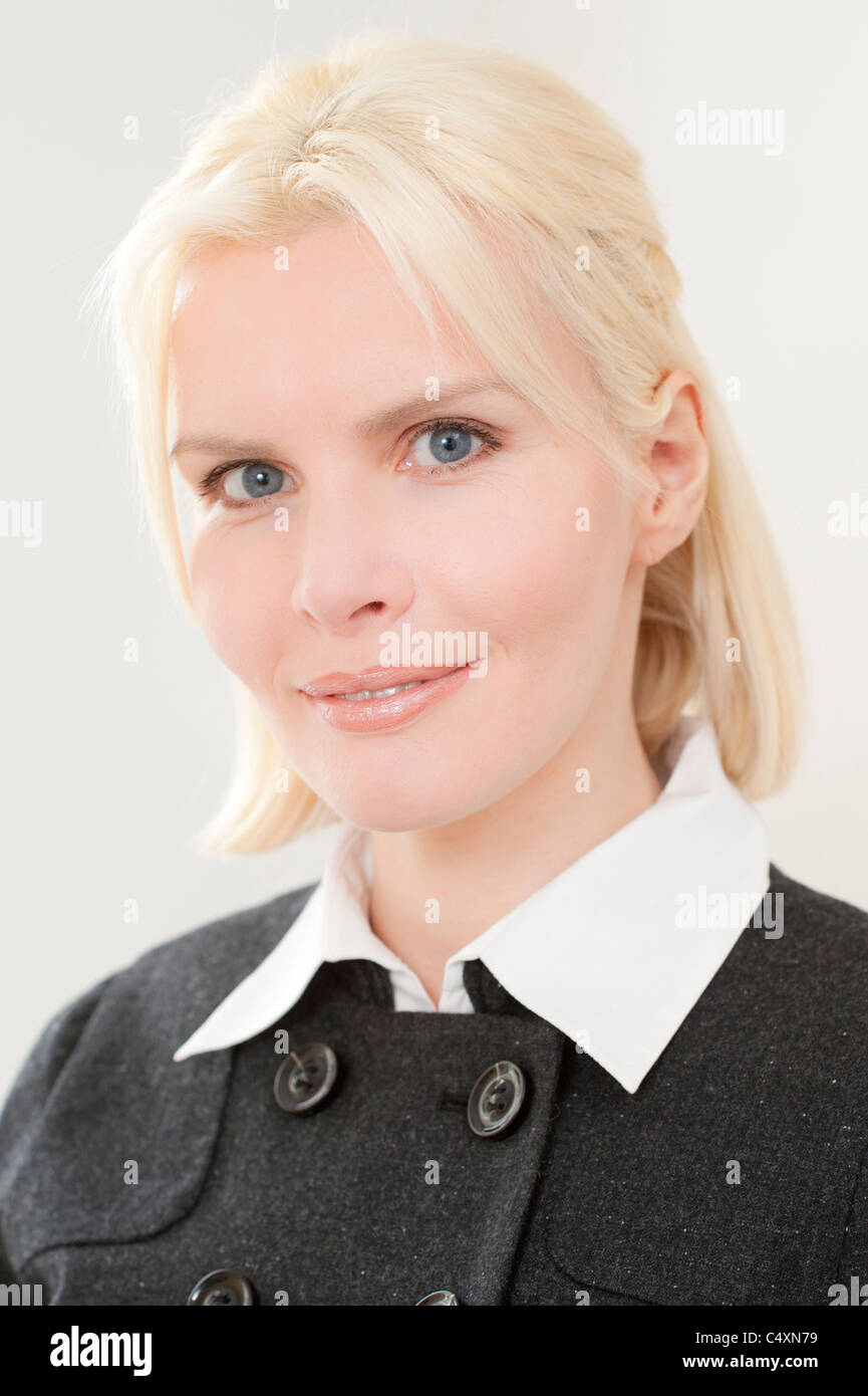 Young and smiling portrait from businesswoman Stock Photo - Alamy