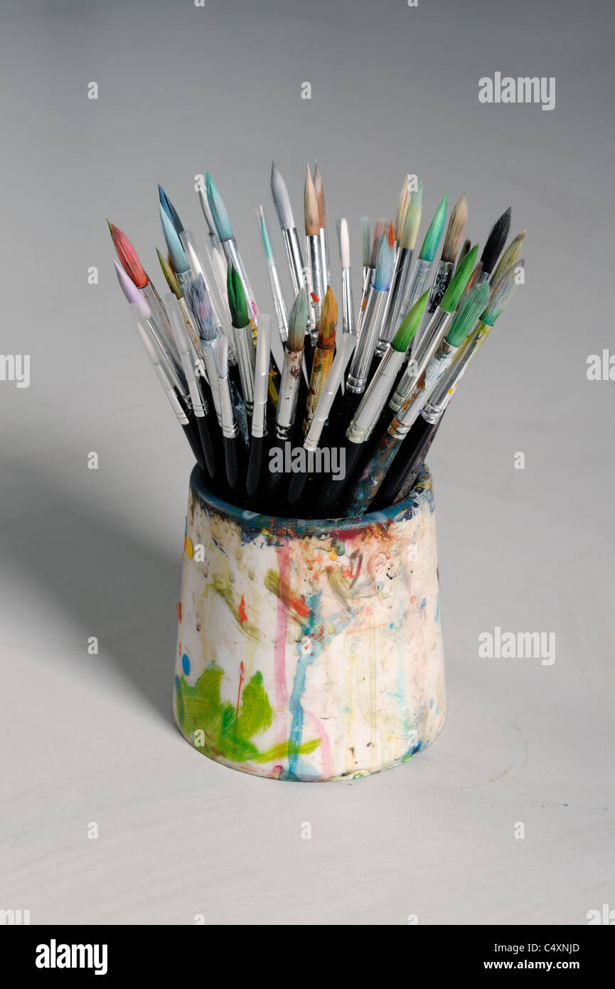 Pot of paintbrushes Stock Photo