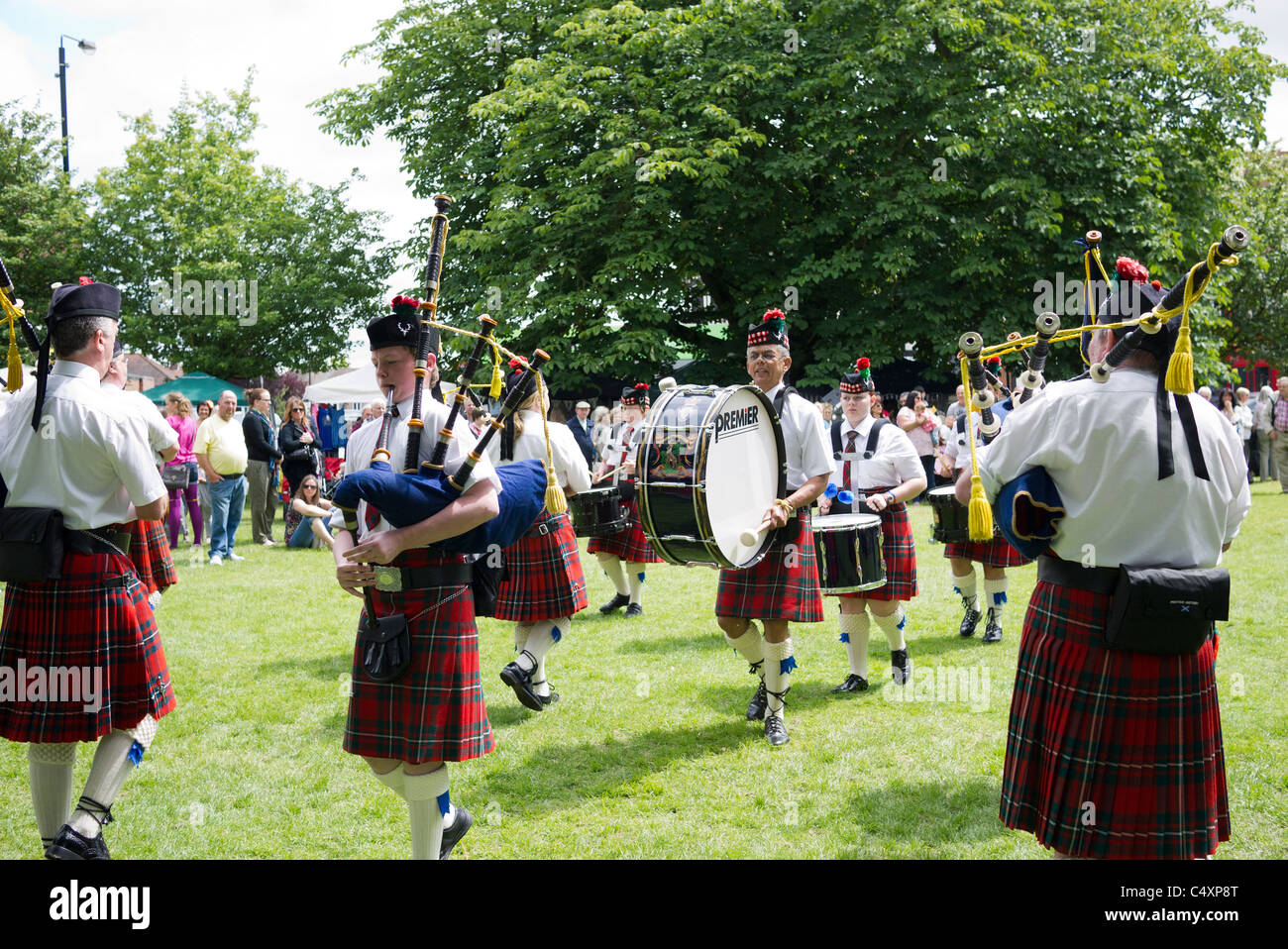 Local bagpipe and drum band play at 'Chingford Village  Festival' Chingford Village Festival Stock Photo