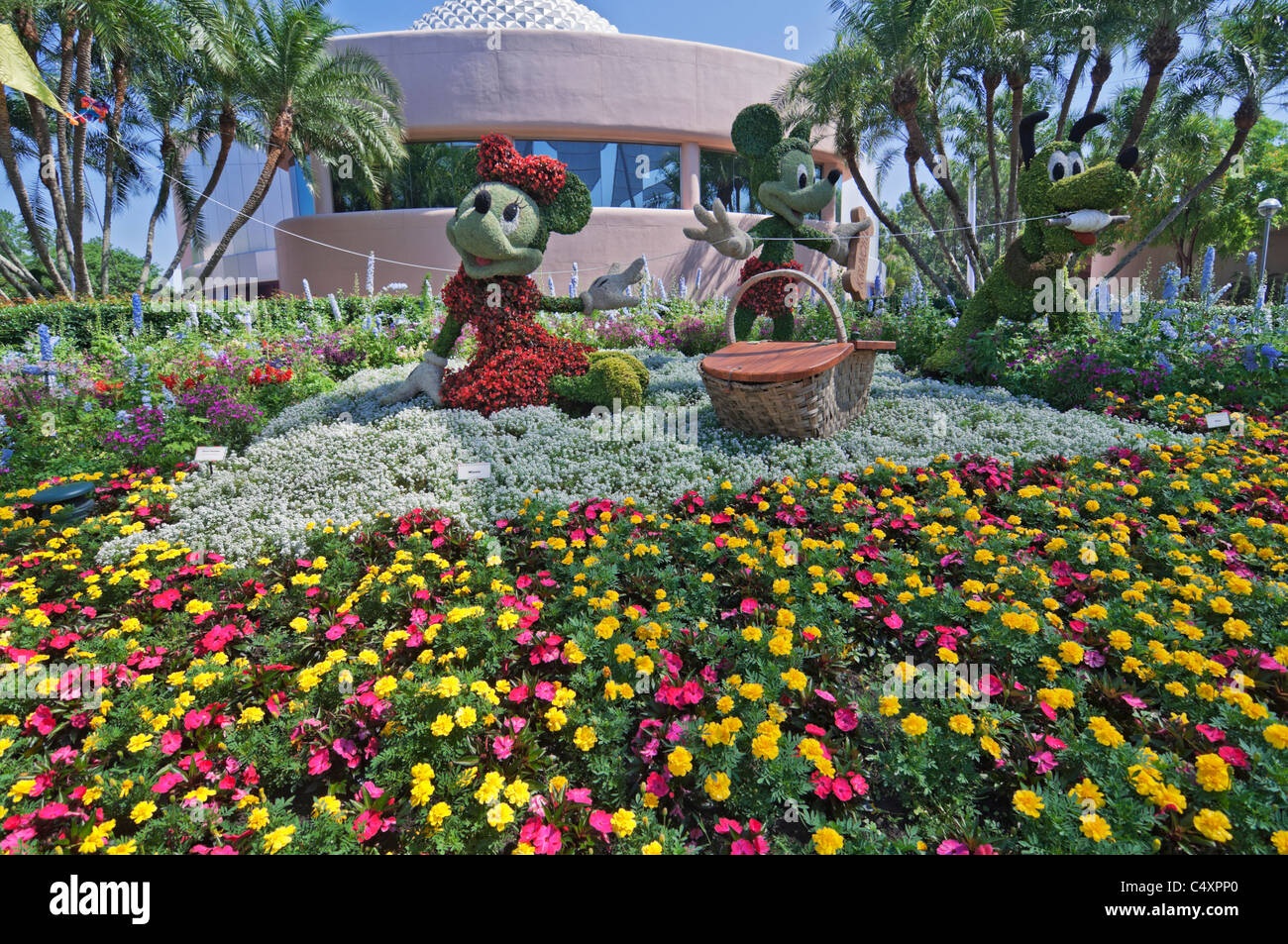 Epcot Center Orlando Florida topiaries of Mickey and Minnie Mouse and Pluto at the annual flower & garden festival Stock Photo
