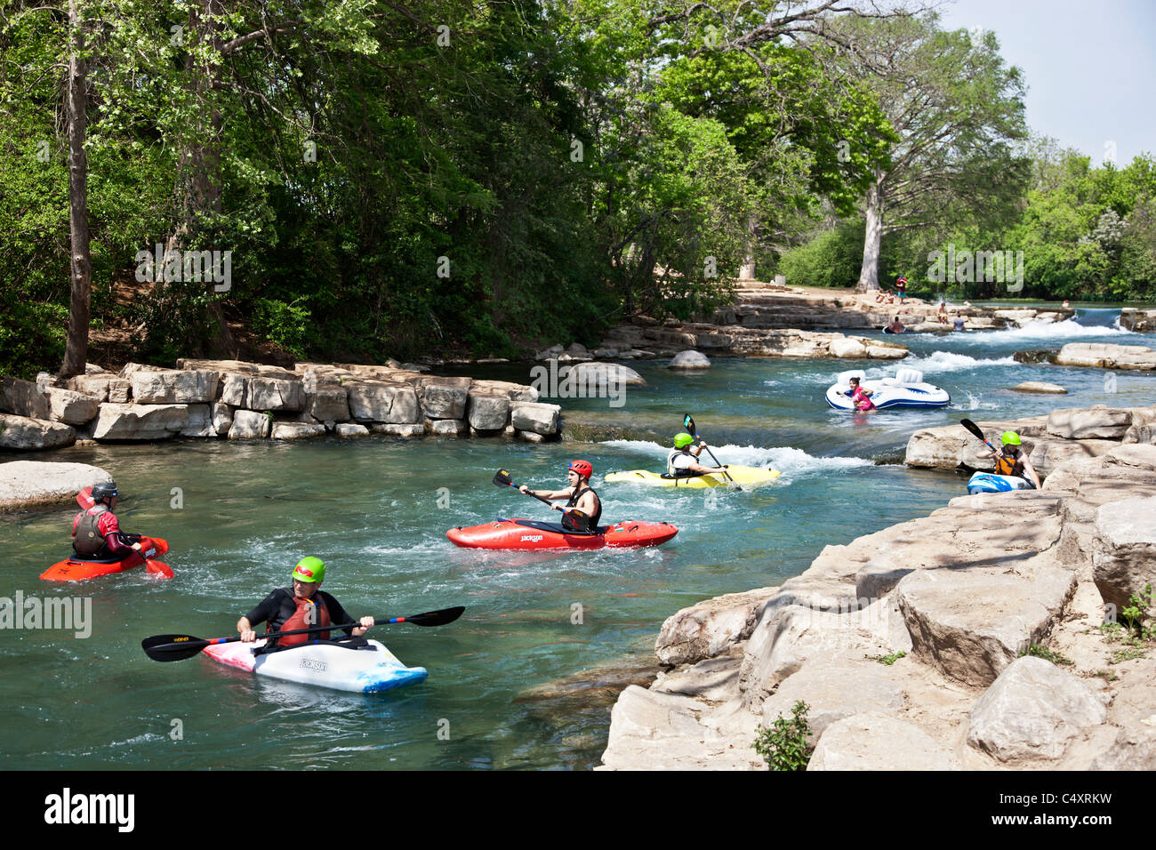 Kayakers maneuvering, San Marcos River, Stock Photo