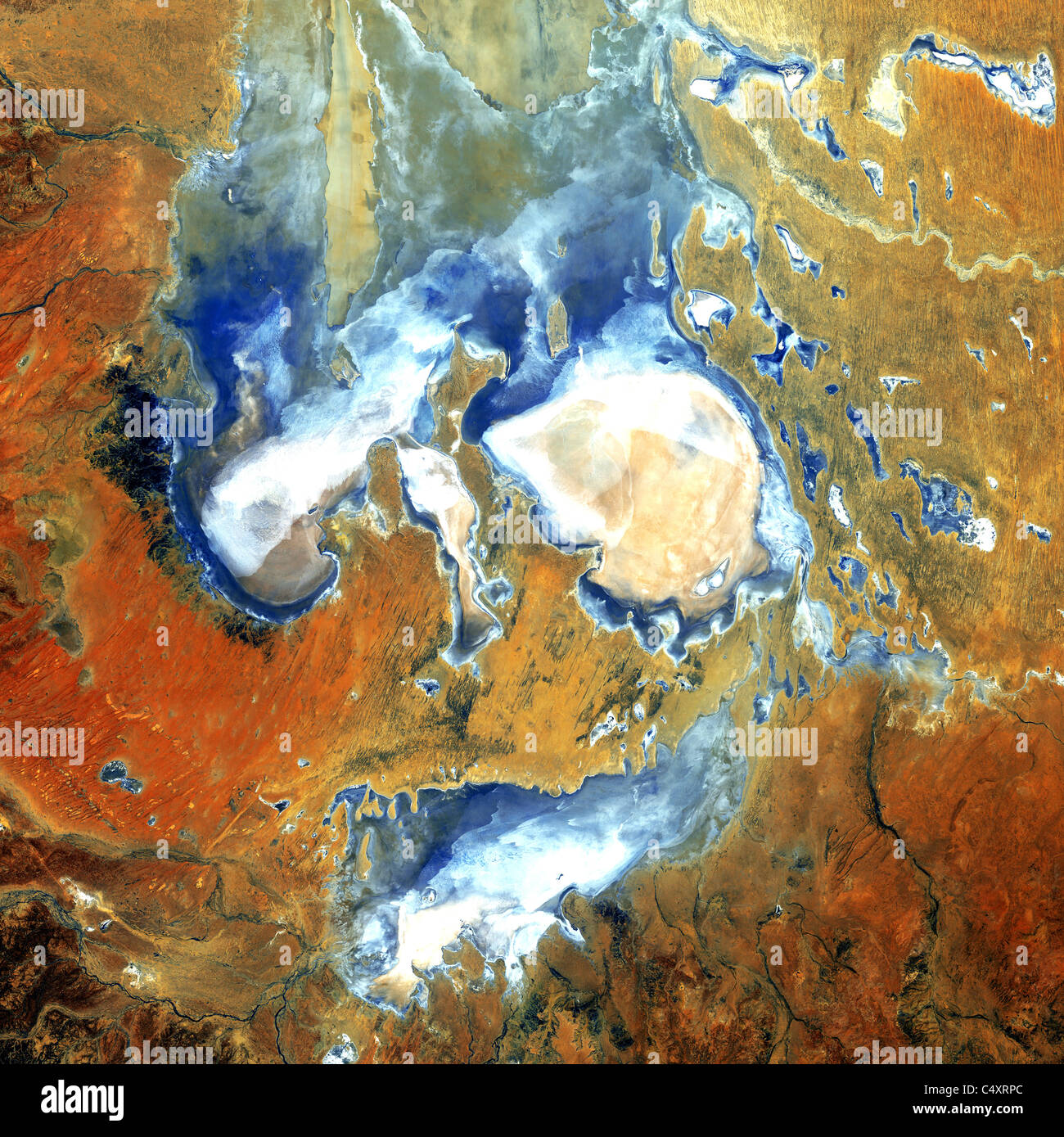 Deep in the desert of northern South Australia, Lake Eyre is an ephemeral feature of as from space in this NASA satellite image. Stock Photo
