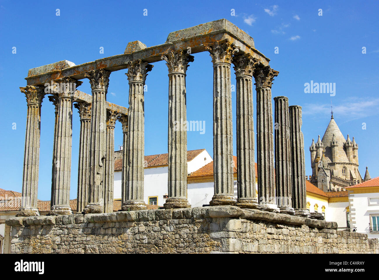 Roman temple and cathedral tower of Evora, Portugal. Stock Photo
