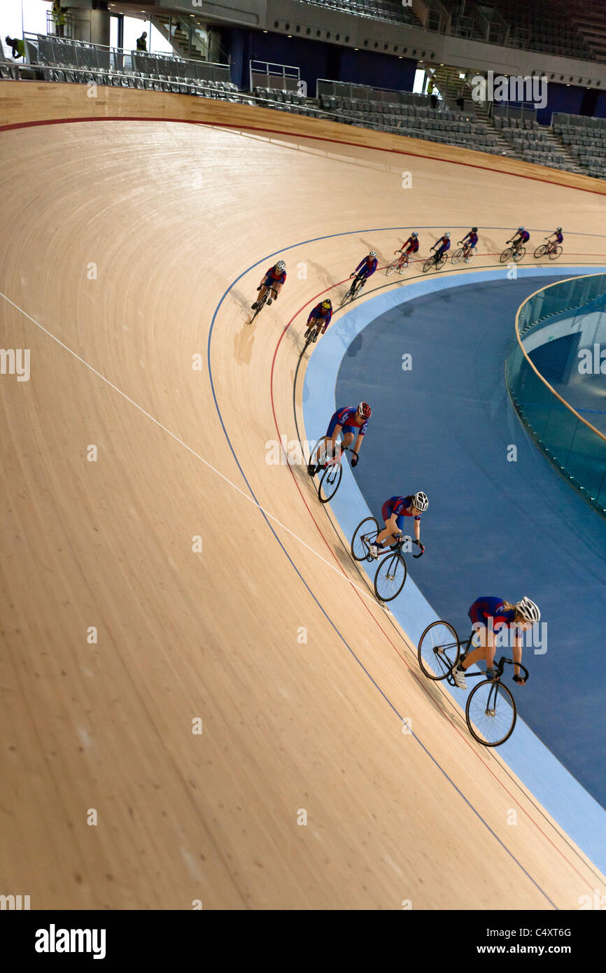 Cyclists race around the track at the London Olympic Velodrome, 2012 Stock Photo