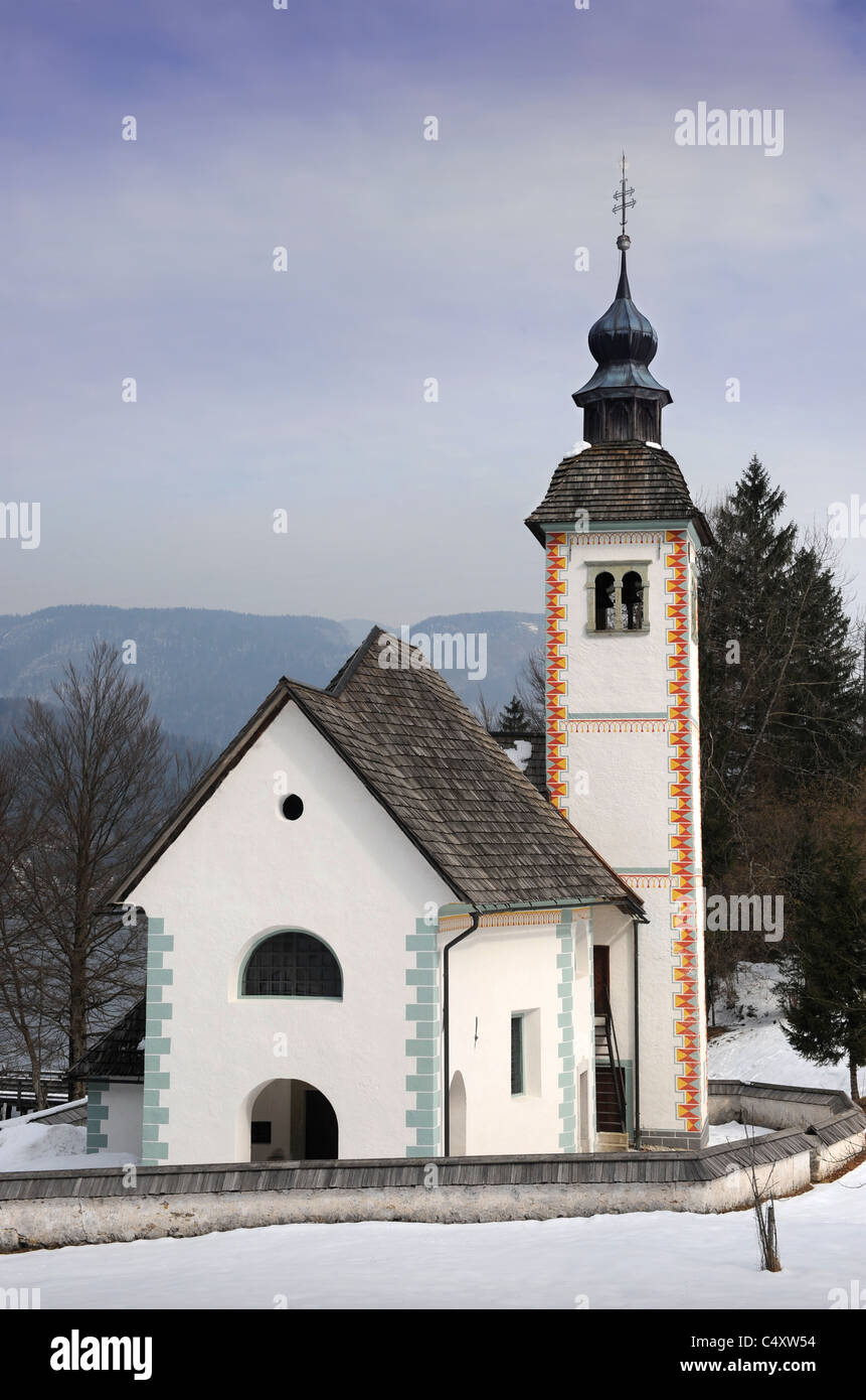 The Church of The Holy Spirit on the southern side of Lake Bohinj in the Triglav National Park of Slovenia Stock Photo