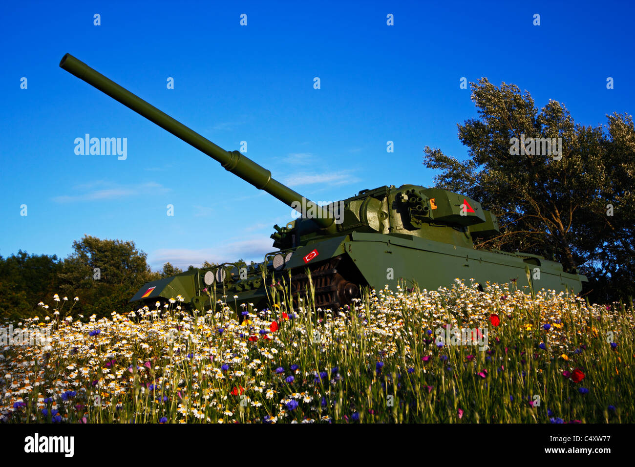 Centurion Tank surrounded by wild flowers in Leyland, Lancashire. Stock Photo