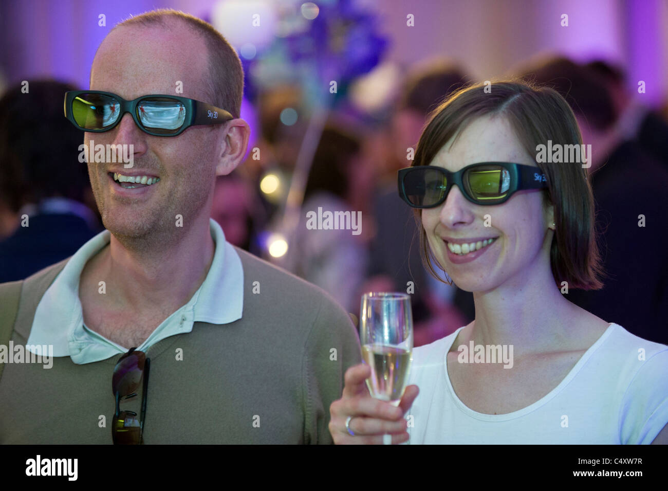 wearing 3D glasses watching tv television Stock Photo Alamy