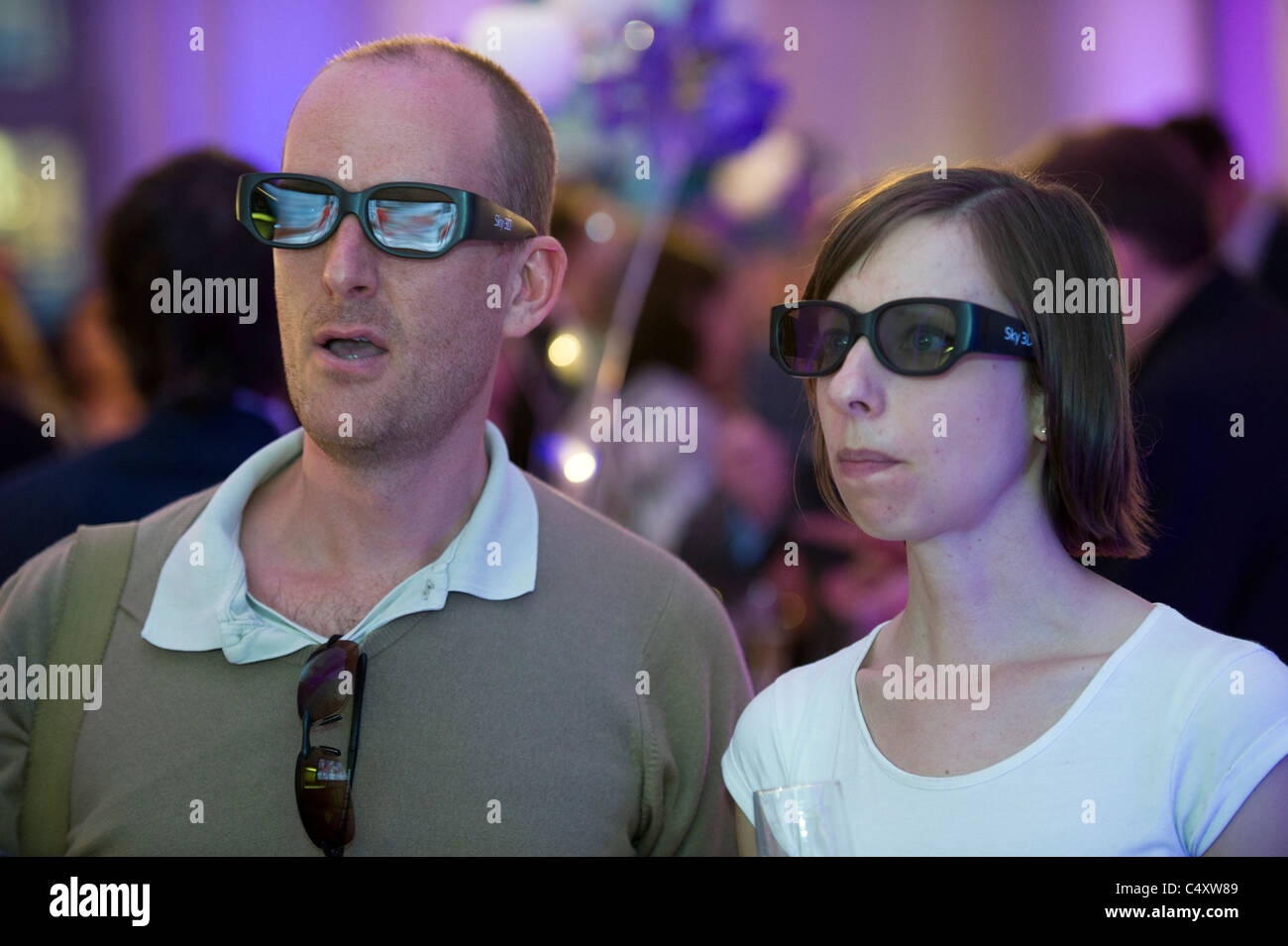 wearing 3D glasses watching tv television Stock Photo Alamy