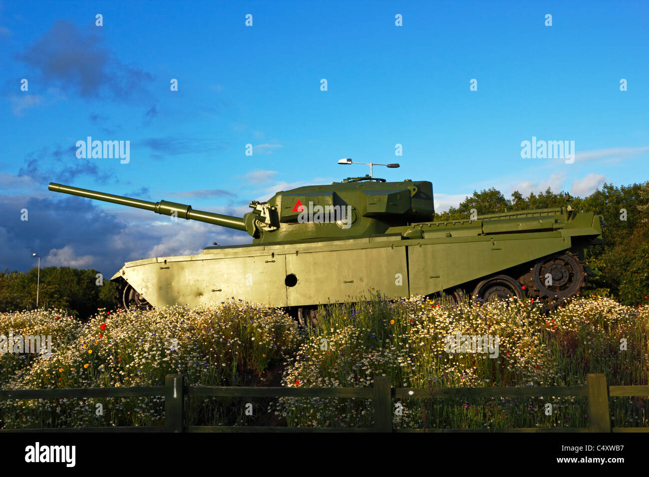 Centurion Tank surrounded by wild flowers in Leyland, Lancashire. Stock Photo