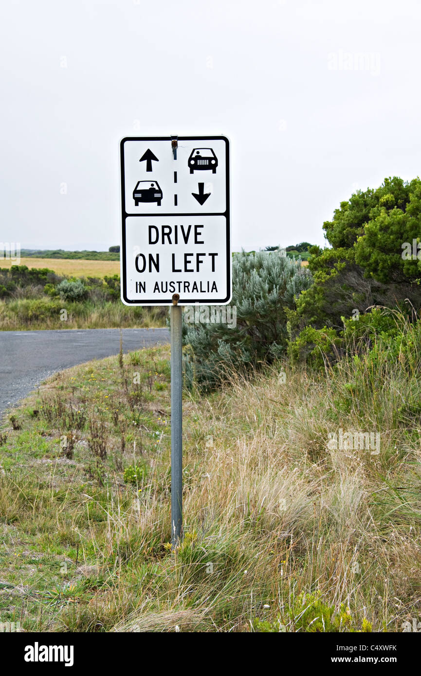 Traffic Warning Sign Advising Drivers to Drive on Left Side of Road near Peterborough Victoria Australia Stock Photo