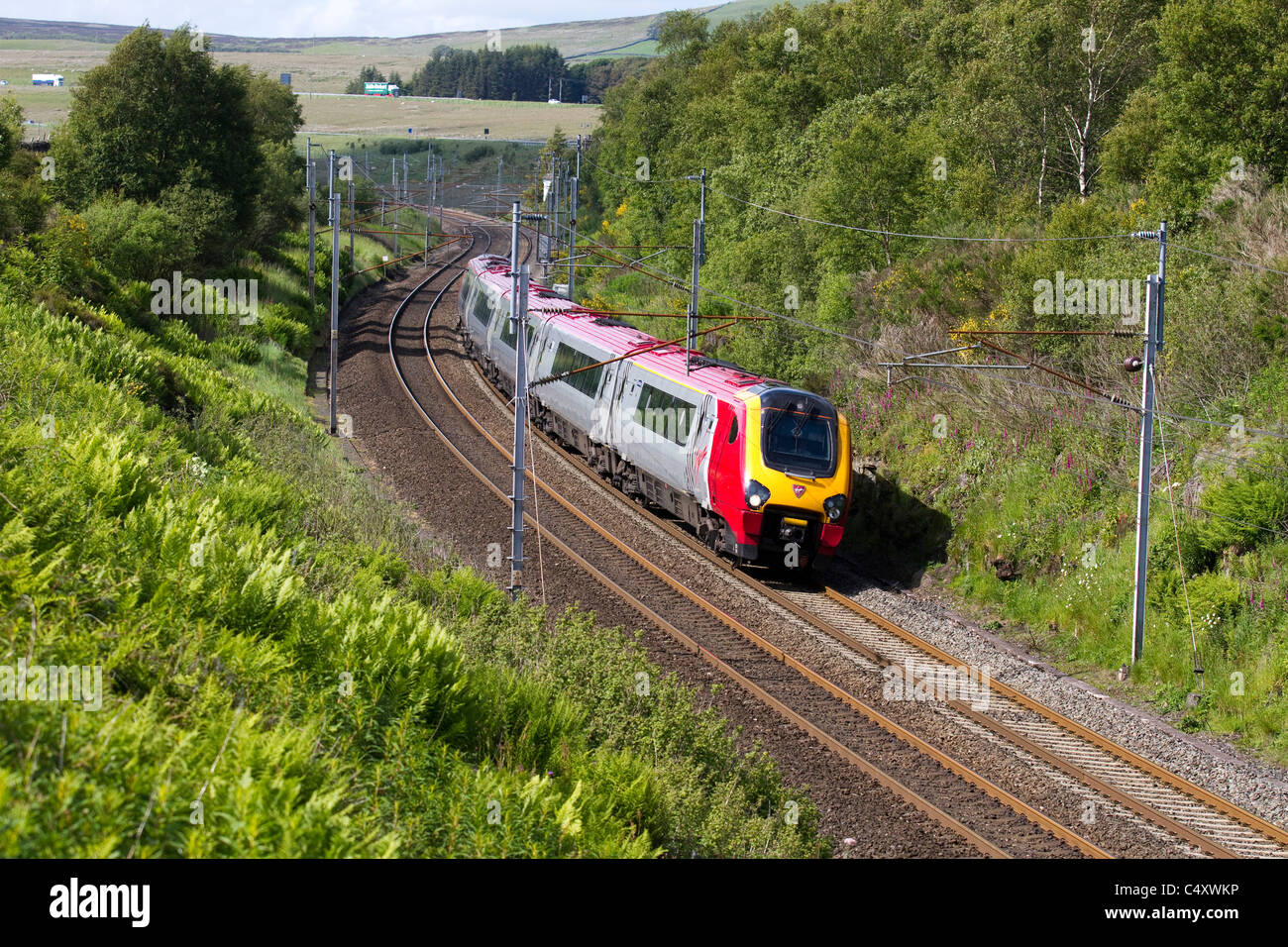 British Railways  Descending Virgin Voyager Train at Shap, West Coast Line, Cumbria, UK Stock Photo