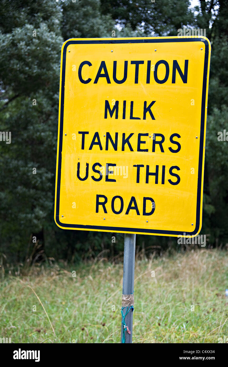 Yellow Traffic Sign Advising Motorists that Milk Tankers Use This Road at Apollo Bay Victoria Australia Stock Photo