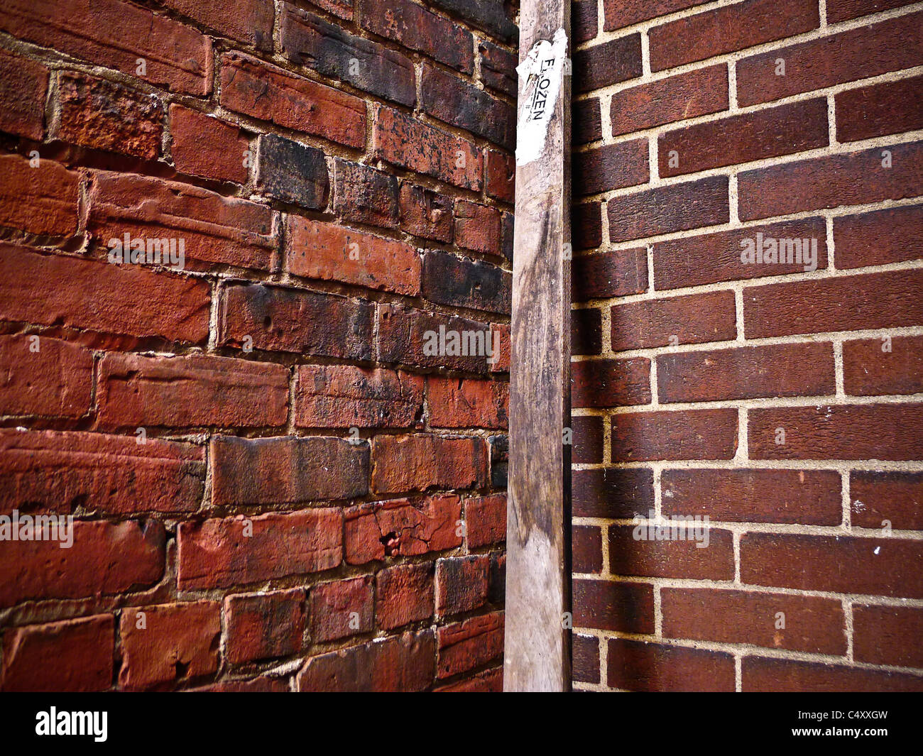 Textured surface of two brick walls. Stock Photo